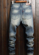 Load image into Gallery viewer, Distressed Denim Jeans

